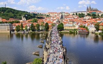 Charles Bridge, a popular task of both residents and tourists in Prague